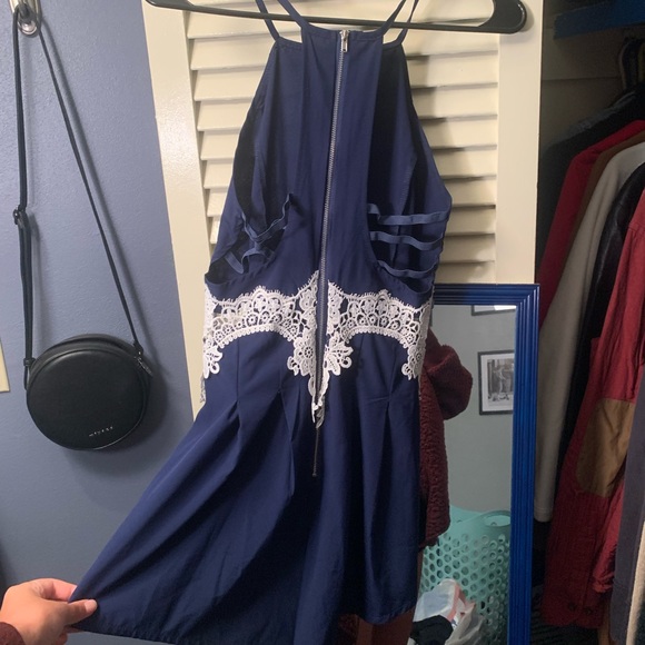 Navy romper with open sides and lace midriff - Picture 5 of 6